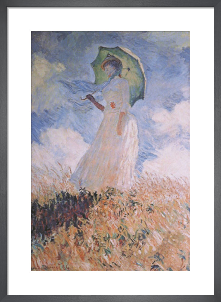 Woman with Parasol by Claude Monet. Framed art print.