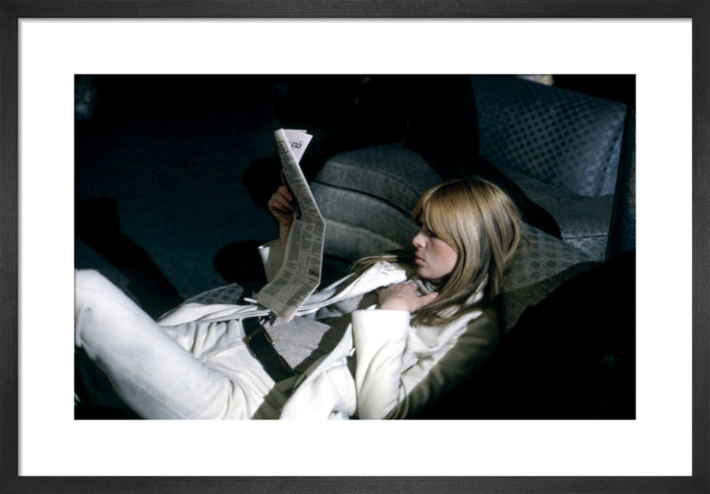 Nico reclines, The Factory NYC, 1966 by Nat Finkelstein. Framed art print.